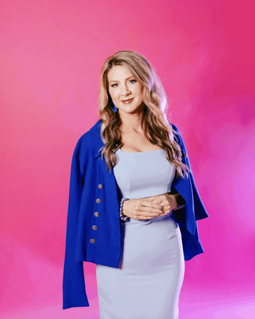 Spring fashion woman in blue blazer and white dress on pink background.