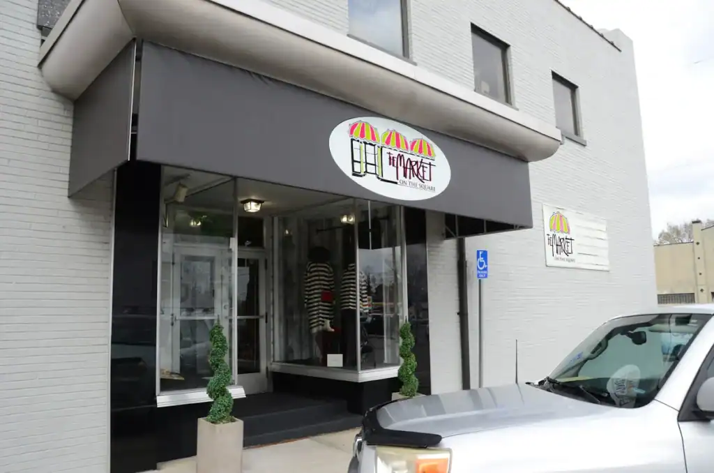 Exterior view of a restaurant entrance with a sign reading "Hometown".