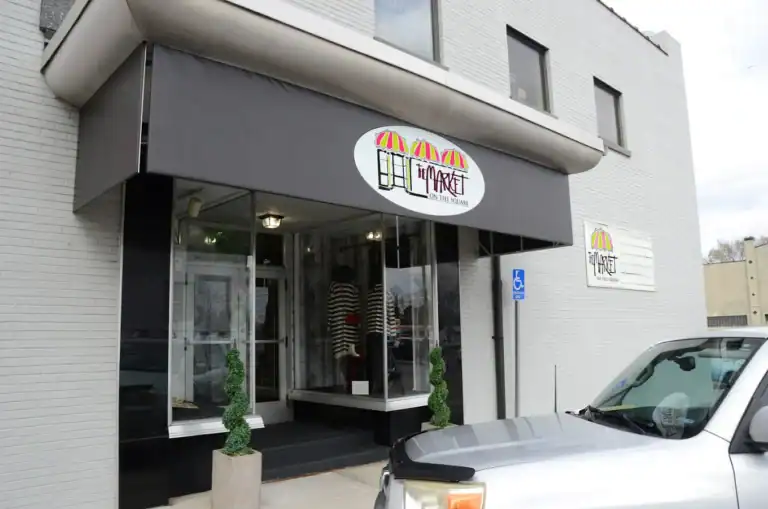 Exterior view of a restaurant entrance with a sign reading "Hometown".