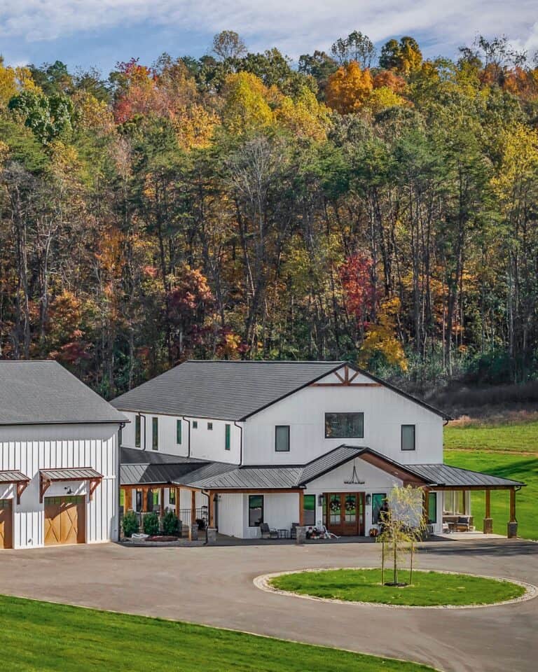 Upper Cumberland modern farmhouse with colorful autumn trees.