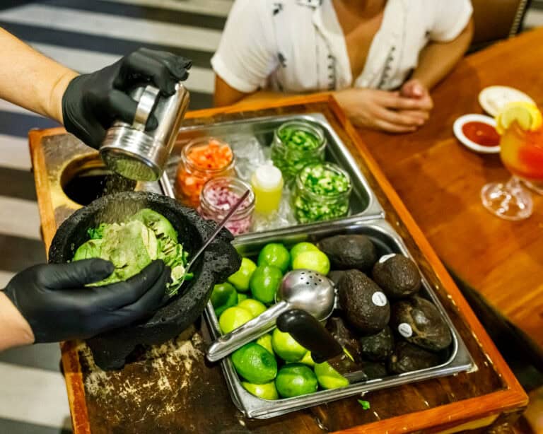 Fresh guacamole with limes, avocados, and vegetables at a local Upper Cumberland restaurant.